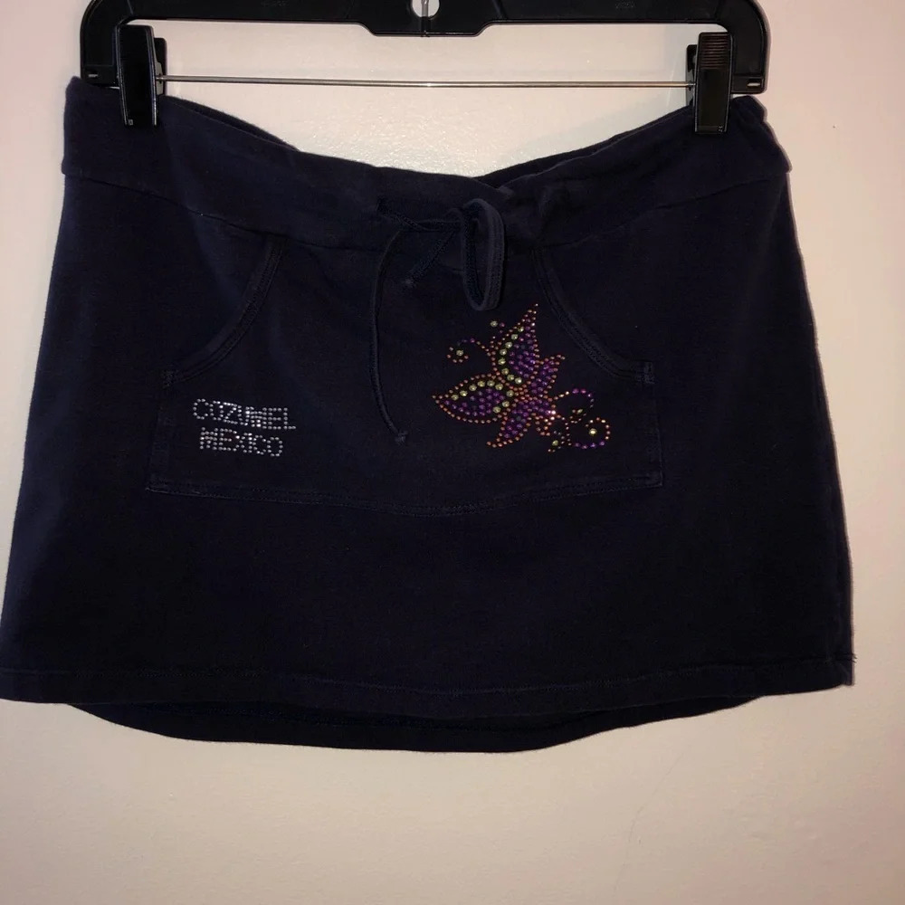 Chrysalis ladies navy blue double pocket‎ mini skirt with beaded embellishments.